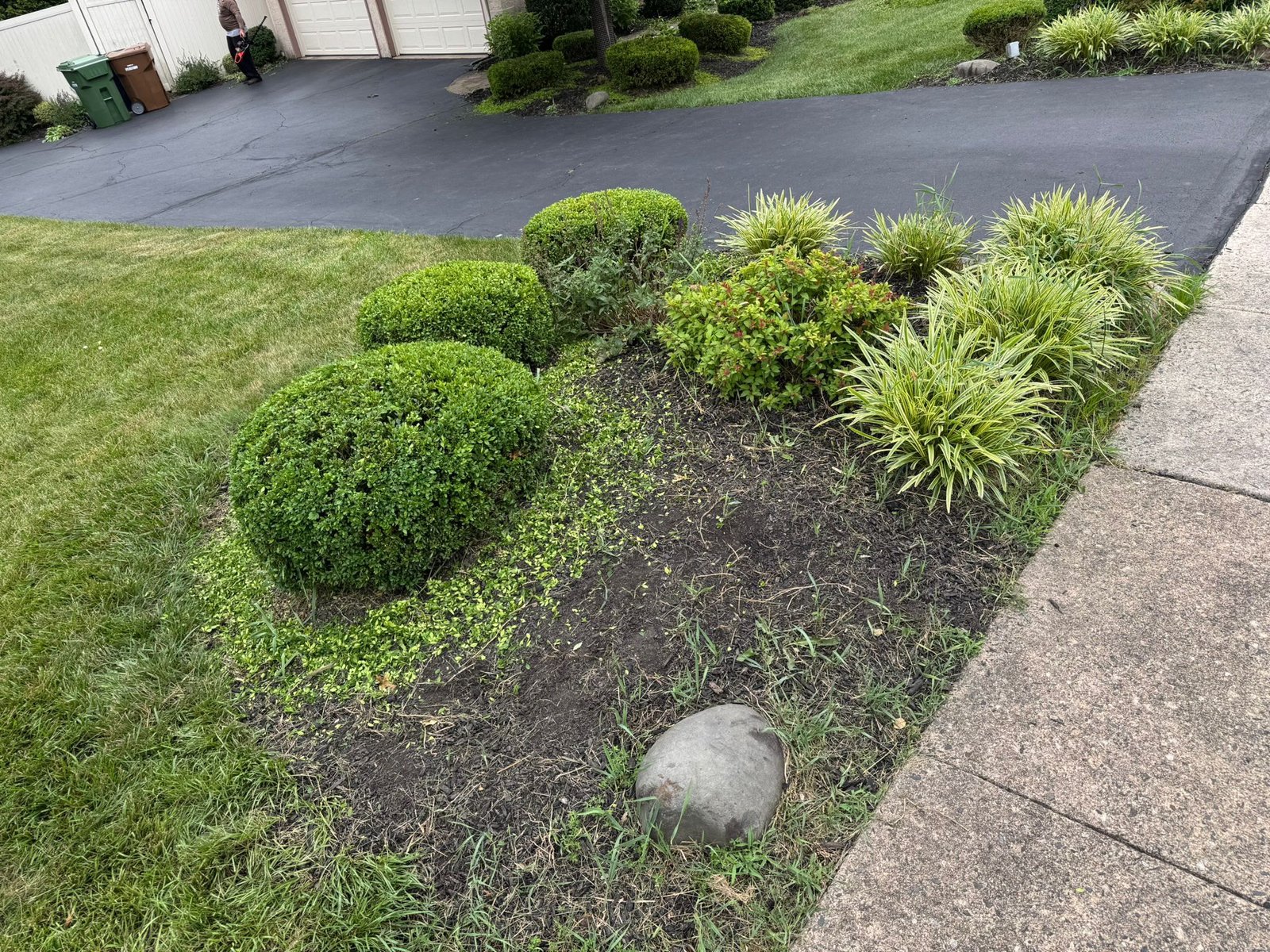 Mulch installation work by Green Force Property Services